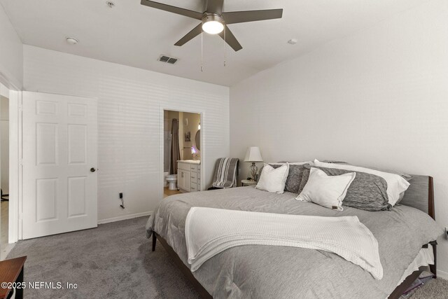 10961 Burnt Mill Rd Unit 318, Jacksonville, FL 32256 - bedroom with carpet floors, baseboards, visible vents, and ensuite bath