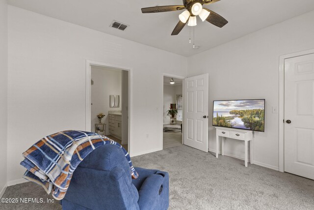 10961 Burnt Mill Rd Unit 318, Jacksonville, FL 32256 - sitting room with carpet flooring, a ceiling fan, baseboards, and visible vents
