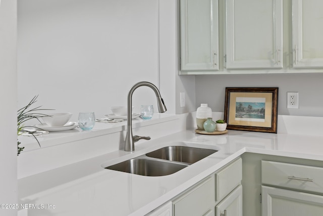 1909 University Blvd S Unit 204, Jacksonville, FL 32216 - kitchen featuring a sink and light countertops