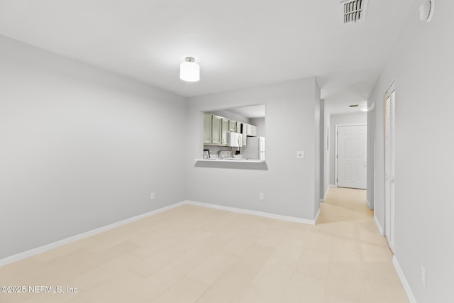 1909 University Blvd S Unit 204, Jacksonville, FL 32216 - empty room with baseboards and visible vents