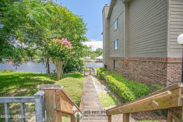 1909 University Blvd S Unit 204, Jacksonville, FL 32216 - view of yard with a water view