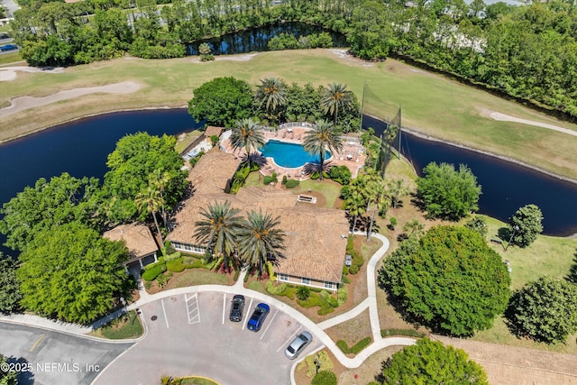 bird's eye view with view of golf course and a water view
