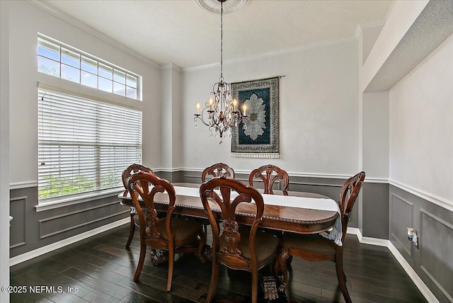 185 Edgewater Branch Dr, Saint Johns, FL 32259 - dining area featuring ornamental molding, dark wood finished floors, and a wainscoted wall