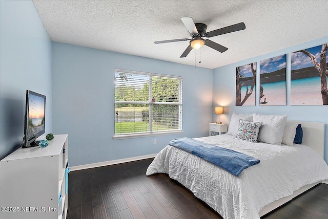 185 Edgewater Branch Dr, Saint Johns, FL 32259 - bedroom featuring a textured ceiling, ceiling fan, dark wood-style floors, and baseboards