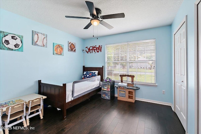 185 Edgewater Branch Dr, Saint Johns, FL 32259 - bedroom featuring a textured ceiling, a ceiling fan, baseboards, hardwood / wood-style flooring, and a closet