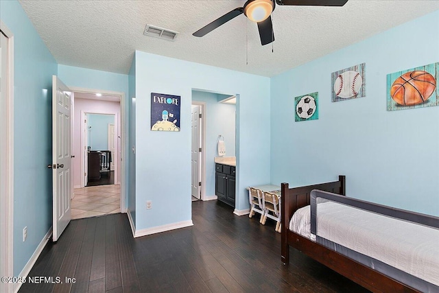 185 Edgewater Branch Dr, Saint Johns, FL 32259 - bedroom with visible vents, a textured ceiling, dark wood finished floors, and baseboards