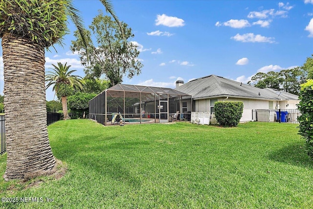 185 Edgewater Branch Dr, Saint Johns, FL 32259 - back of house with a lawn, a fenced in pool, a lanai, and a fenced backyard