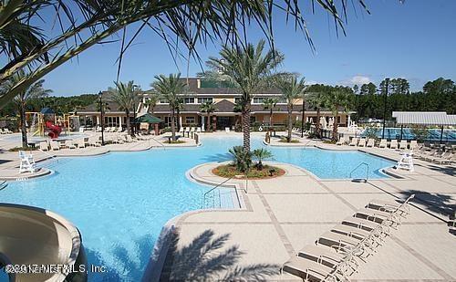 185 Edgewater Branch Dr, Saint Johns, FL 32259 - community pool with a patio