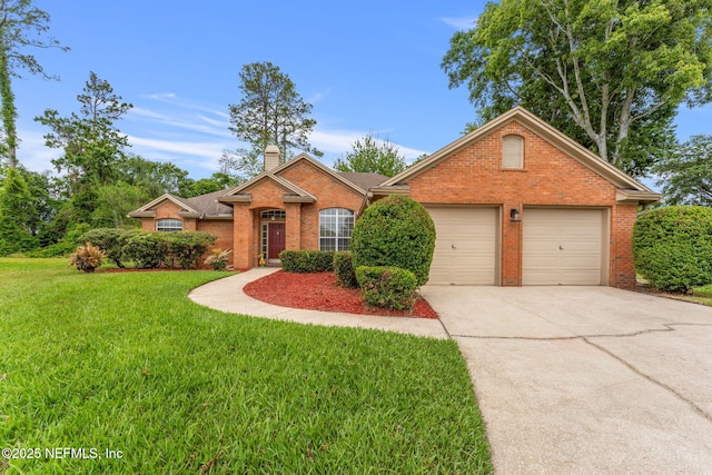 ranch-style home with a chimney, a garage, brick siding, a front lawn, and concrete driveway