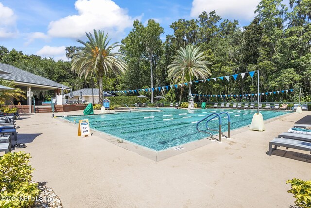 community pool featuring a patio