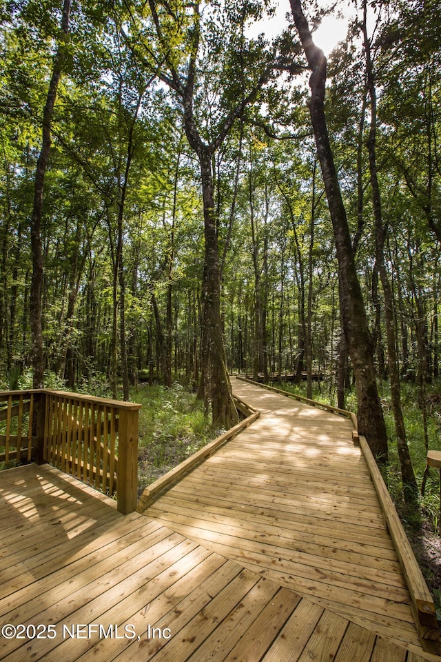 119 Craig Ct, Saint Johns, FL 32092 - wooden deck with a forest view