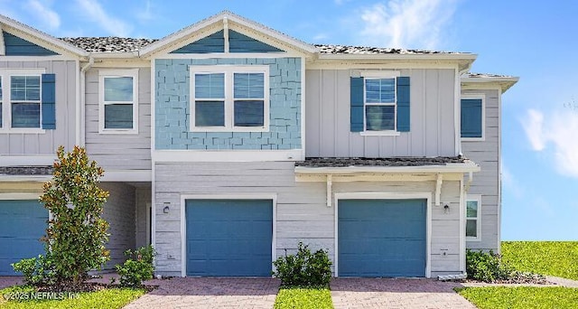 119 Craig Ct, Saint Johns, FL 32092 - multi unit property featuring a garage, board and batten siding, and decorative driveway