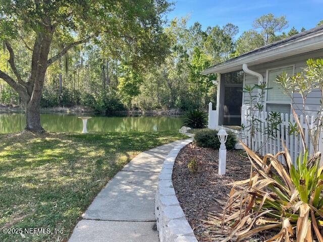 1831 Moss Creek Dr SW, Fleming Island, FL 32003 - view of yard featuring a water view