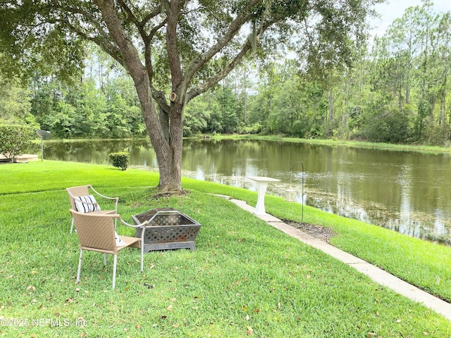 1831 Moss Creek Dr SW, Fleming Island, FL 32003 - view of yard with a water view, a fire pit, and a forest view