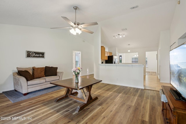 13198 Ebbtide Ct, Jacksonville, FL 32225 - living area featuring a ceiling fan, light wood-style floors, and high vaulted ceiling
