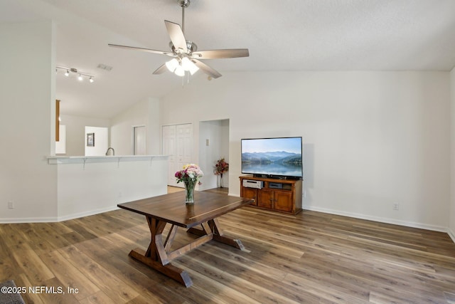 13198 Ebbtide Ct, Jacksonville, FL 32225 - living room featuring a ceiling fan, wood finished floors, baseboards, and high vaulted ceiling