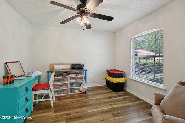 13198 Ebbtide Ct, Jacksonville, FL 32225 - rec room with wood finished floors, baseboards, ceiling fan, and a textured ceiling