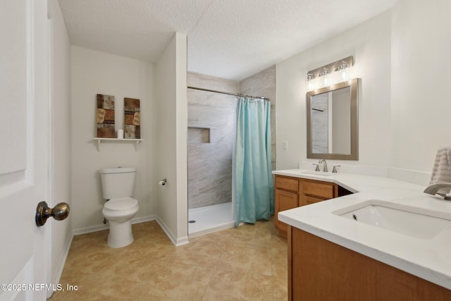 13198 Ebbtide Ct, Jacksonville, FL 32225 - bathroom featuring a shower with shower curtain, double vanity, toilet, a textured ceiling, and tile patterned flooring