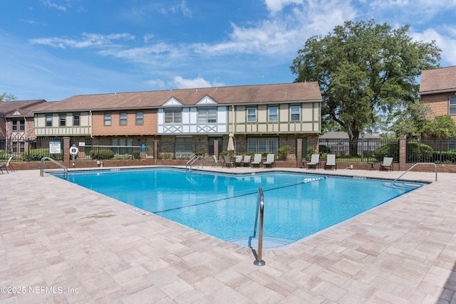 8195 Trafalgar Sq, Jacksonville, FL 32217 - community pool with fence and a patio area