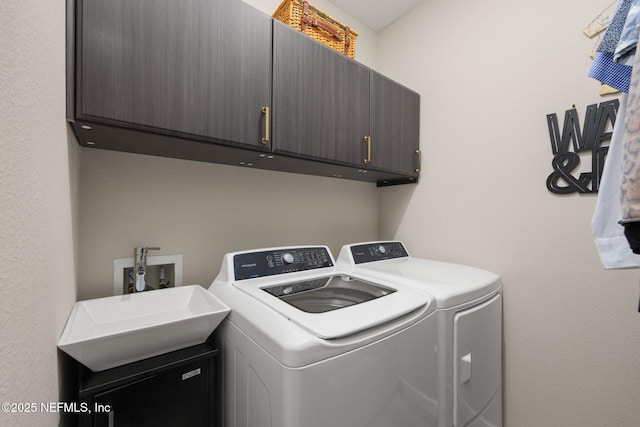 124 Tintamarre Dr, Saint Augustine, FL 32259 - laundry area featuring cabinet space, separate washer and dryer, and a sink