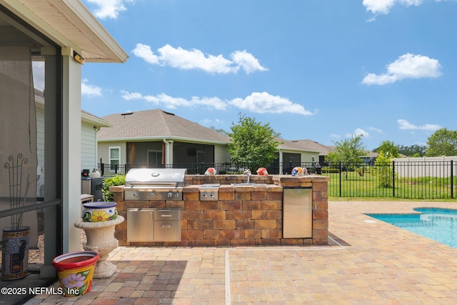 124 Tintamarre Dr, Saint Augustine, FL 32259 - view of patio featuring area for grilling, a fenced in pool, a fenced backyard, and a sink