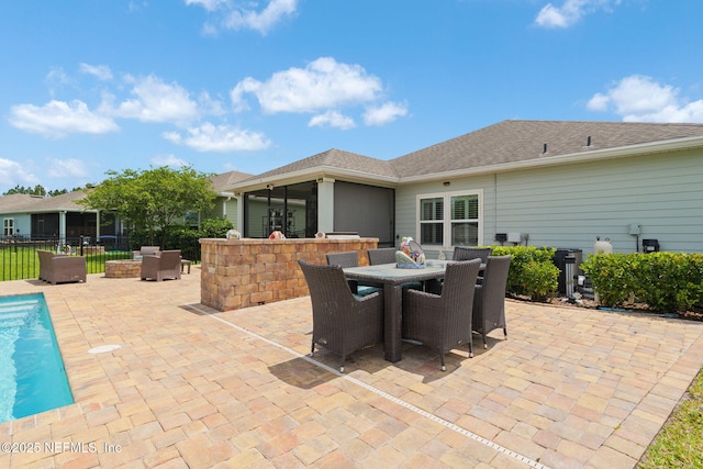 124 Tintamarre Dr, Saint Augustine, FL 32259 - view of patio with fence, outdoor dining space, and a fenced in pool