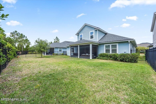 77 Palisade Dr, Saint Augustine, FL 32092 - rear view of property featuring a fenced backyard, a yard, a shingled roof, and a sunroom
