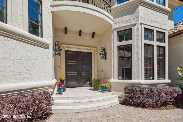 108 Harbourmaster Ct, Ponte Vedra Beach, FL 32082 - doorway to property with stucco siding
