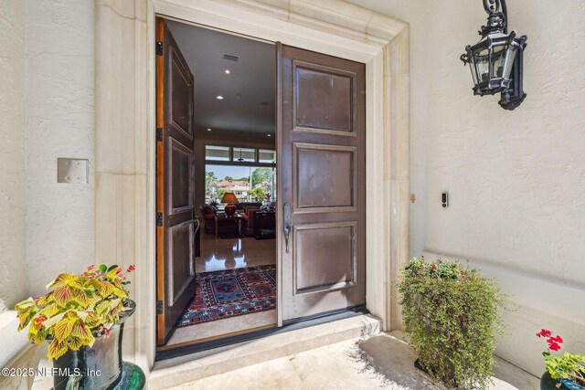 108 Harbourmaster Ct, Ponte Vedra Beach, FL 32082 - doorway to property with stucco siding
