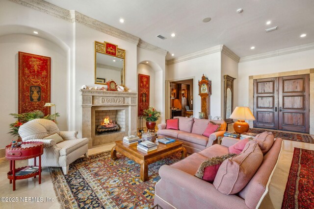 108 Harbourmaster Ct, Ponte Vedra Beach, FL 32082 - living area featuring ornamental molding, a warm lit fireplace, and recessed lighting