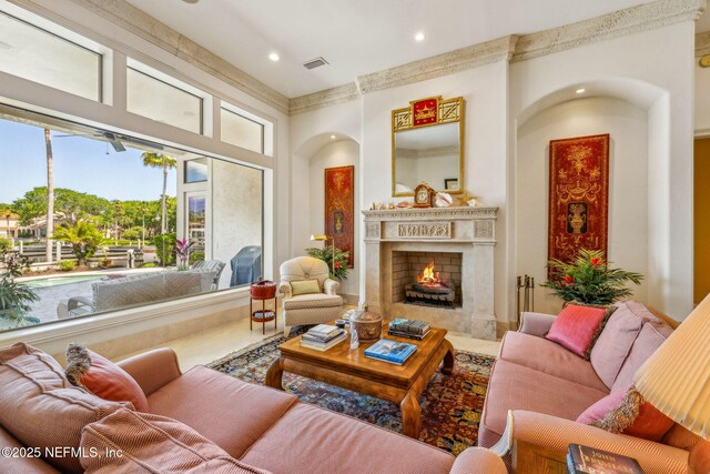 108 Harbourmaster Ct, Ponte Vedra Beach, FL 32082 - living area featuring a fireplace, recessed lighting, a high ceiling, and arched walkways