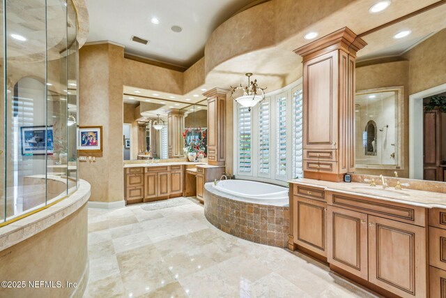 108 Harbourmaster Ct, Ponte Vedra Beach, FL 32082 - full bath featuring a bath, ornamental molding, ornate columns, two vanities, and recessed lighting