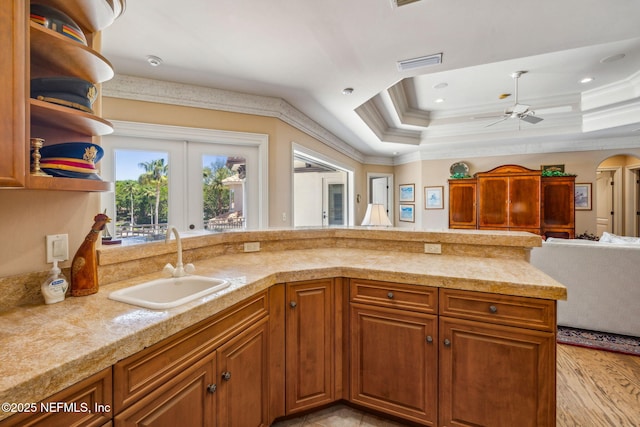 108 Harbourmaster Ct, Ponte Vedra Beach, FL 32082 - kitchen with a sink, a ceiling fan, open shelves, ornamental molding, and open floor plan