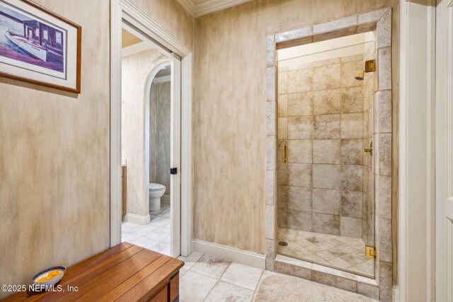 108 Harbourmaster Ct, Ponte Vedra Beach, FL 32082 - bathroom featuring a stall shower, toilet, and crown molding