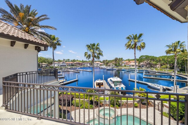 108 Harbourmaster Ct, Ponte Vedra Beach, FL 32082 - view of patio / terrace featuring a boat dock, a water view, boat lift, and a pool with connected hot tub