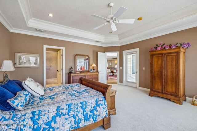 108 Harbourmaster Ct, Ponte Vedra Beach, FL 32082 - bedroom featuring a tray ceiling, ornamental molding, light carpet, a ceiling fan, and a textured ceiling