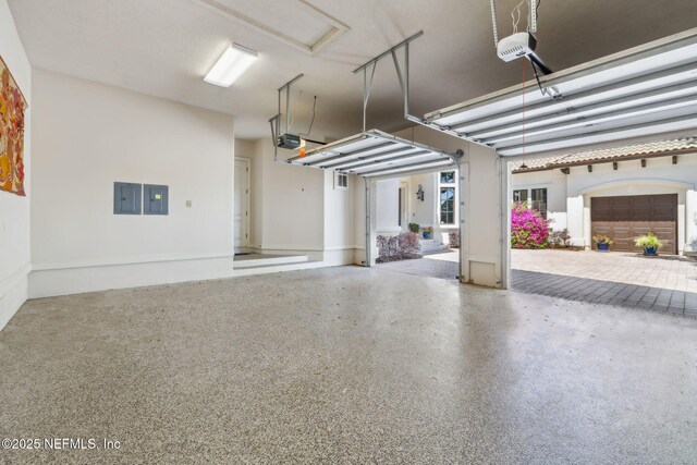 108 Harbourmaster Ct, Ponte Vedra Beach, FL 32082 - garage featuring a garage door opener and electric panel