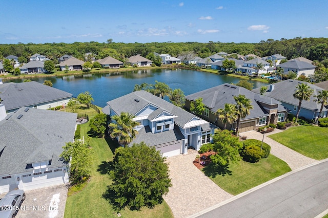 aerial view with a residential view and a water view
