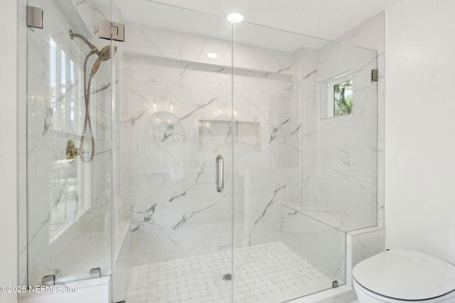 2930 Apache Ave, Jacksonville, FL 32210 - full bathroom featuring toilet and a marble finish shower
