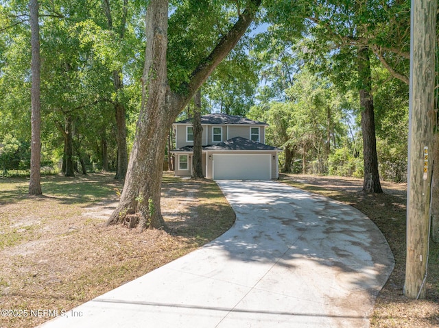 4220 Ribault River Ln, Jacksonville, FL 32209 - view of front facade with a garage and concrete driveway