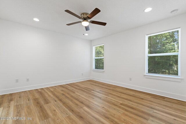 4220 Ribault River Ln, Jacksonville, FL 32209 - spare room with baseboards and light wood-style flooring
