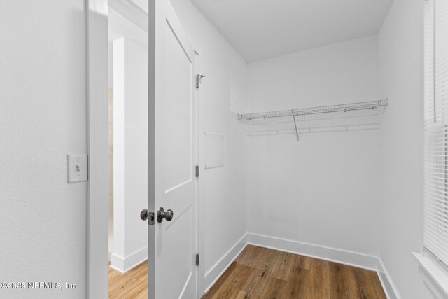 4220 Ribault River Ln, Jacksonville, FL 32209 - spacious closet with wood finished floors