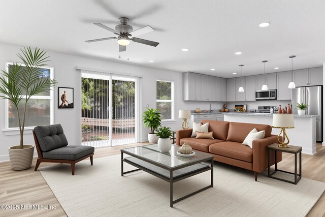 4220 Ribault River Ln, Jacksonville, FL 32209 - living area with recessed lighting, baseboards, ceiling fan, and light wood finished floors
