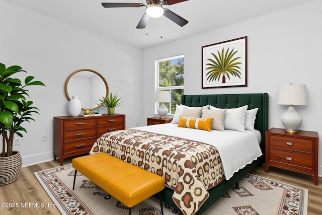 4220 Ribault River Ln, Jacksonville, FL 32209 - bedroom with baseboards, a ceiling fan, and wood finished floors
