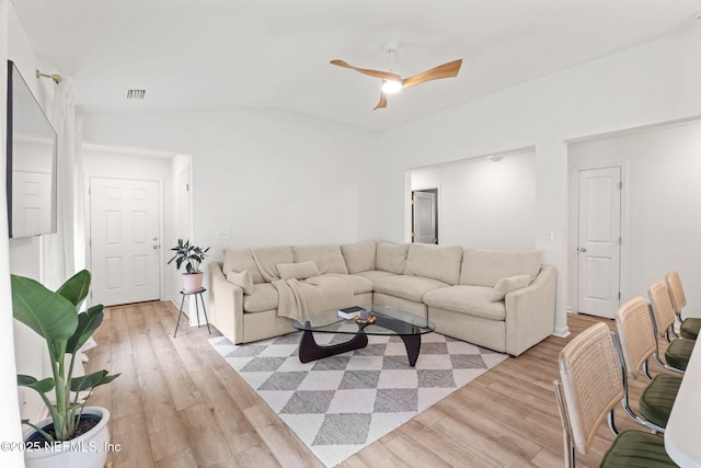 80 Boulder Ln, Saint Johns, FL 32259 - living area with lofted ceiling, light wood finished floors, and a ceiling fan