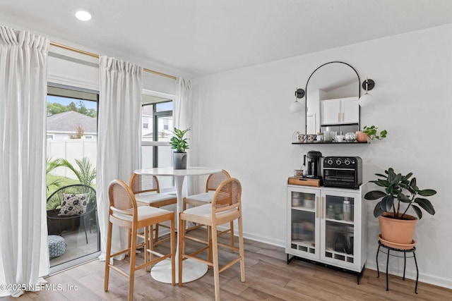 80 Boulder Ln, Saint Johns, FL 32259 - dining space with light wood-style flooring, baseboards, and recessed lighting