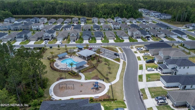80 Boulder Ln, Saint Johns, FL 32259 - aerial view of residential area with a pool and a heavily wooded area
