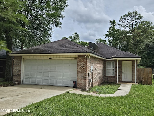 ranch-style house featuring fence, an attached garage, a front lawn, brick siding, and concrete driveway