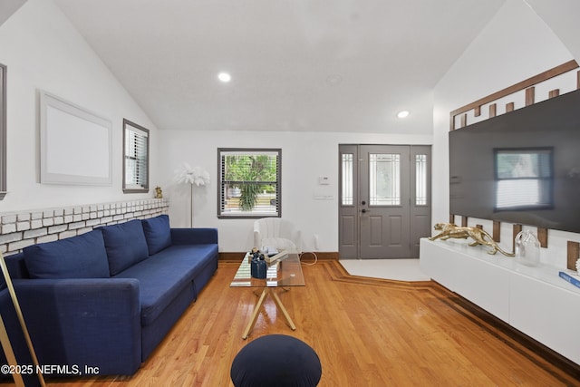 6878 Lenox Ave, Jacksonville, FL 32205 - living room featuring recessed lighting, light wood finished floors, and lofted ceiling