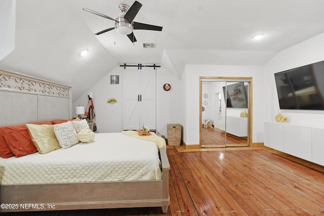 6878 Lenox Ave, Jacksonville, FL 32205 - bedroom featuring visible vents, lofted ceiling, recessed lighting, hardwood / wood-style flooring, and a ceiling fan